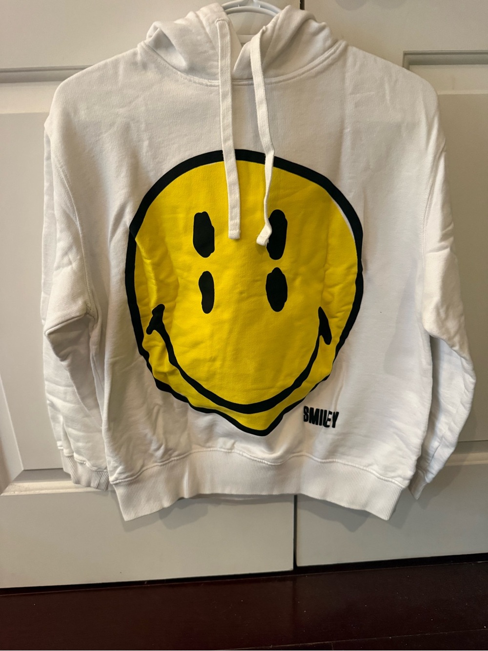 Zara White Hoodie with Yellow Smiley Graphic